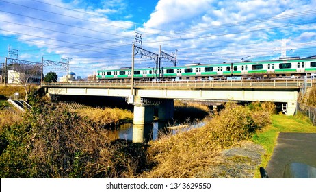 Train of Joban Line running on an iron bridge