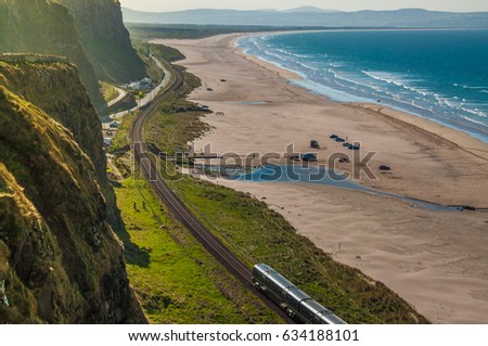 Train journey between Londonderry and Coleraine near the Atlantic Ocean, one of the most beautiful rail journeys in the world.