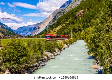 Train In The Mountains Of Switzerland