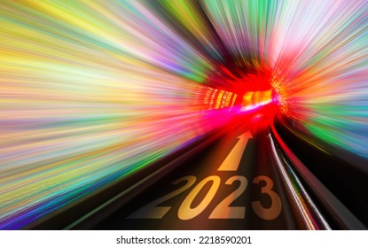 Train Moving Fast From New Year 2023 In Tunnel With Arrow Sign