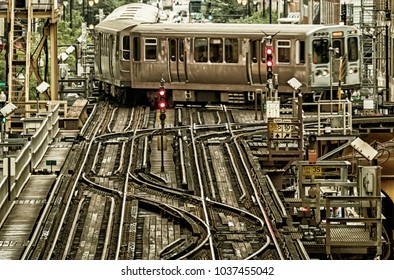 Train on elevated tracks within buildings at the Loop, Chicago City Center - Black Gold Artistic Effect - Chicago, Illinois, USA