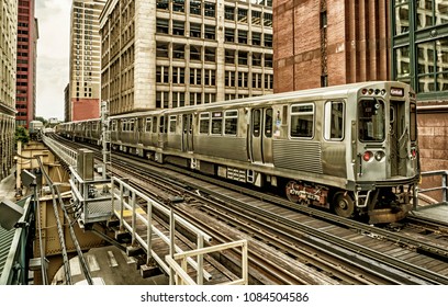 Train on elevated tracks within buildings at the Loop, Chicago City Center - Black Gold Artistic Effect - Chicago, Illinois, USA