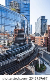 Train on elevated tracks within buildings at the Loop, Chicago City Center, Illinois, USA