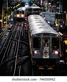 Train on elevated tracks within buildings at the Loop, Chicago City Center - Vintage Dark Deep Tonal Artistic Effect - Chicago, Illinois, USA