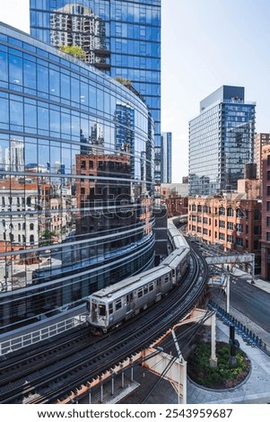 Train on elevated tracks within buildings at the Loop, Chicago City Center, Illinois, USA
