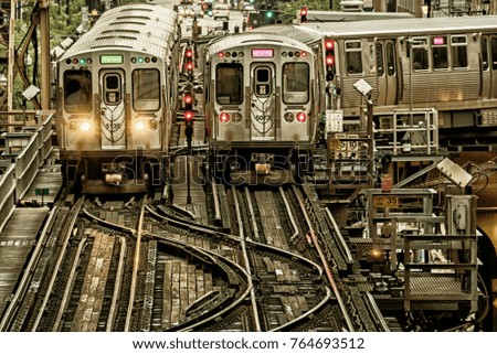 Train on elevated tracks within buildings at the Loop, Chicago City Center - Black Gold Artistic Effect - Chicago, Illinois, USA