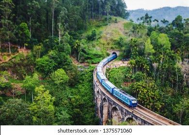 Train on the Nine Arch Bridge in Sri Lanka. Travel to Ceylon island, popular travel  destination in Asia