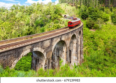 Train on the Nine Arches Demodara Bridge or the Bridge in the sky. Nine Arches Bridge is located in Demodara near Ella city, Sri Lanka.