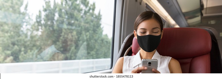 Train Passenger Asian Business Woman Using Mobile Phone During Travel Commute Wearing Face Mask For Corona Virus Pandemic. Panoramic Banner Of Businesspeople Commuting.