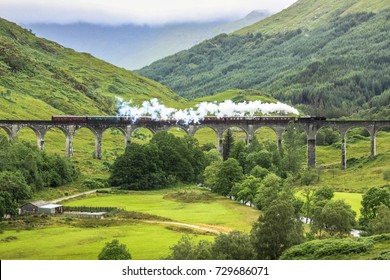 Train Passing Glenfinnan Viaduct, Scotland