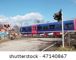 A train passing a level crossing