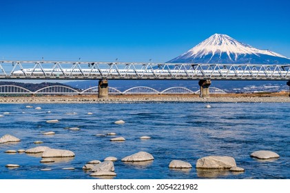 ฺฺBullet Train Train Passing Mount Fuji And The Fujikawa Bridge, Shizuoka, Japan