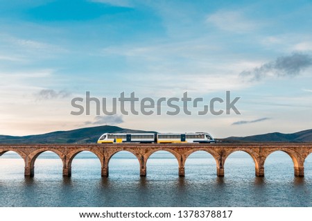Train passing over the bridge that crosses the ebro reservoir