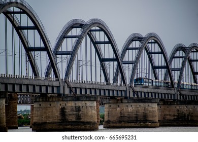 A Train Passing Though Thr Godavari Arch Bridge In The Rajamahendravaram City, India.