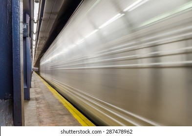 Train Pulling into the Platform of a Subway Station. Motion Blurred.