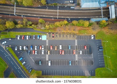 Train Railway Station And Car Park Aerial View From Above UK