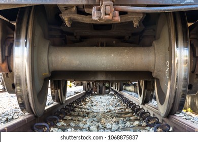 Train Run Over, Under the train.
