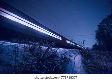 Train In Russia  , Snow  And Light  From  Windows. Transsiberian Express. 
 Stylized  In  Blue. 