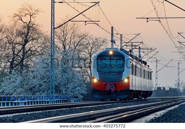 Train in the setting\
sun