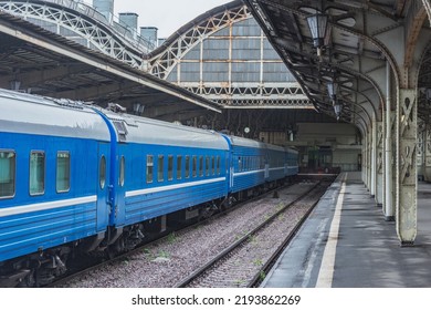 Train stands by the platform before departure.
