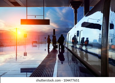 train stop at railway station and sunset