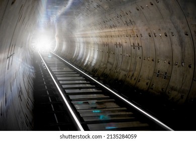 Train In Subway Tunnel. Fast Speed Subway Train Moving. Traffic Speeding Through A Modern Tunnel. Speed Motion Through A Tunnel