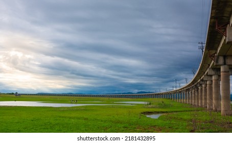 The Train Track Above The Lake Is Like Floating On The Water As Unseen, Light At The End Of The Train As A Success Or To Something Better.