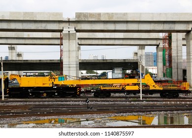 Train track installation vehicle machine and repair of railroad.
