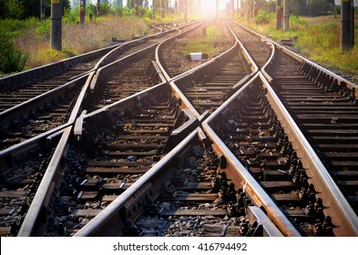 Train tracks leading into the sunset - Shutterstock ID 416794492