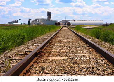 Train Tracks Leading To A Potash Mine In Central Canada.