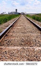 Train Tracks Leading To A Potash Mine In Central Canada.