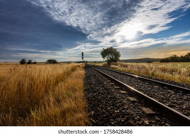 Train Tracks on a field near Hillerod in Denmark - Powered by Shutterstock