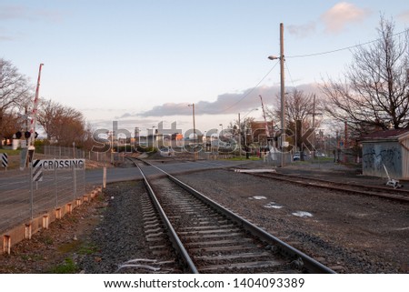 Train Tracks at Rail Crossing, Ballarat, Victoria, Australia at Sunset