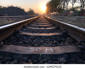 Train tracks at sunset