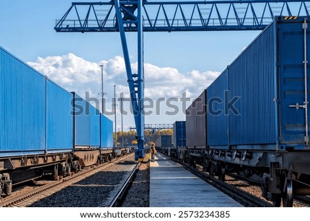 Train traffic. Container loading and unloading station. Logistics railway hub
