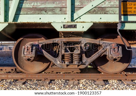 Train wheels on an old box car. Nanton, Alberta, Canada