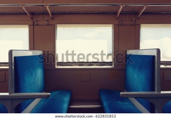 Train\
windows and seats. Scenery of old Japanese\
train.