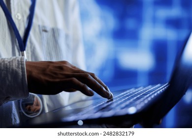 Trained developer writes code on laptop to visualize artificial intelligence neural networks using augmented reality, close up. Server farm specialist runs AI script for information processing
