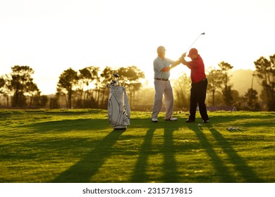 Trainer, golf course or man with help, teaching or fitness with training, lesson or skills. Male person, player or coach with golfer, advice or sports with professional, physical activity or exercise - Powered by Shutterstock