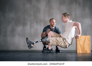 Trainer, person with a disability and prosthetic leg and dumbbell in physiotherapy, studio and gym ball. Male people, physiotherapist and amputee for wellness, fitness and exercise in sports center - Powered by Shutterstock