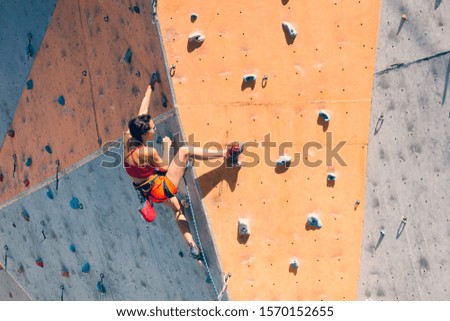 Similar – Image, Stock Photo Girl climbs climbing wall