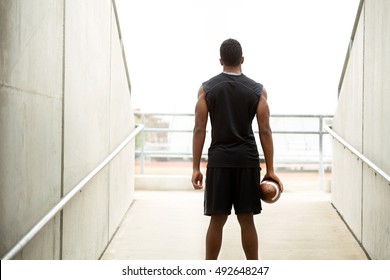 Training Day.  American Football Athlete Heading Out On The Field For Training.