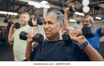 Training, group and senior men exercise together at the gym lifting weights with dumbbells equipment for strength. Elderly, old and fitness people workout in a sports club for wellness and health - Powered by Shutterstock