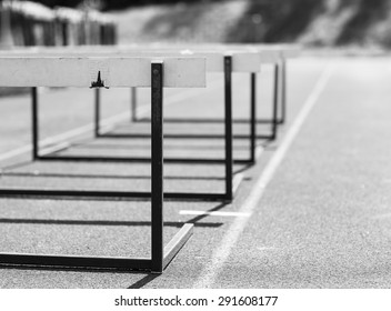 Training hurdles in the track. Image taken in the summer time and image has a vintage effect.
