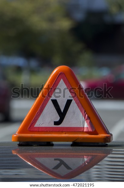 Training a\
large car sign on the roof plan\
background