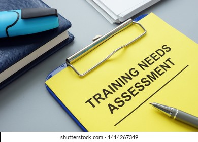 Training Needs Assessment TNA Report With Clipboard.