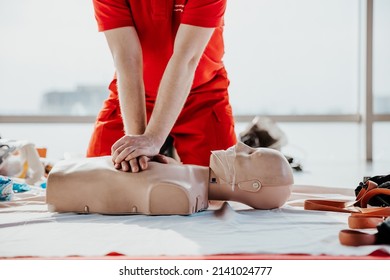 Training on emergency medical care was conducted by a Red Cross instructor in the office space for the civilian population of Ukraine due to the military attack on Russia - Shutterstock ID 2141024777