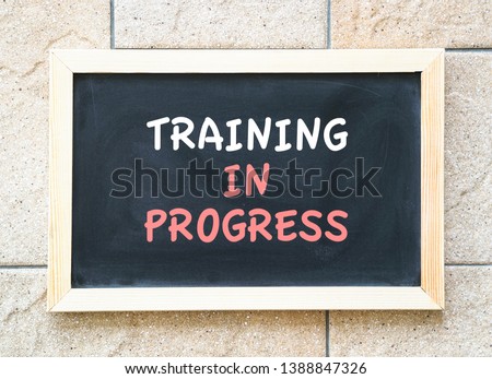 Training in progres, words on a blackboard, a business or human resources concept