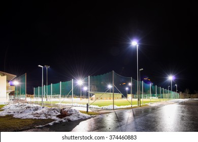 training soccer field with flood light at night in winter
