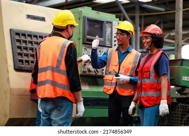 Training Trainee Concept. Caucasian Male Engineer Explain The Procedure For Using The Correct Metal Robot Machine At Lathe Industrial Factory.